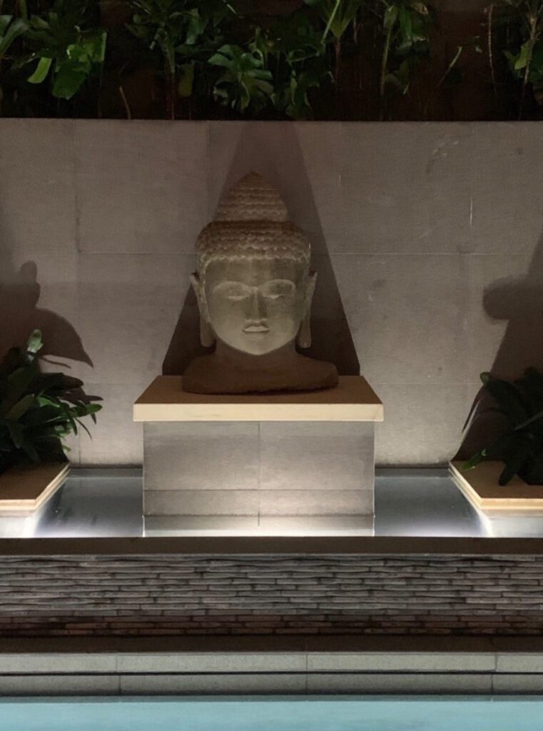 Buddha statue  and water feature designed by Daniel Stewart at The Strand in Dana Point, CA.