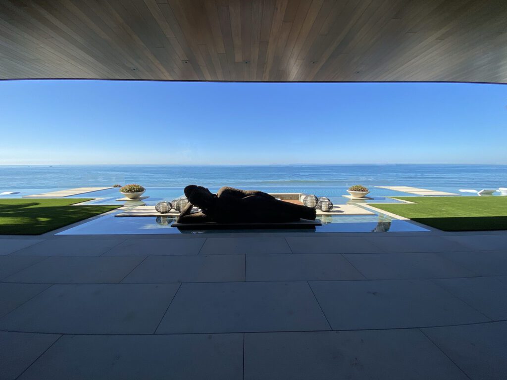 Pool designed by Daniel Stewart at The Strand in Dana Point, CA.  Buddha statue in the foreground.