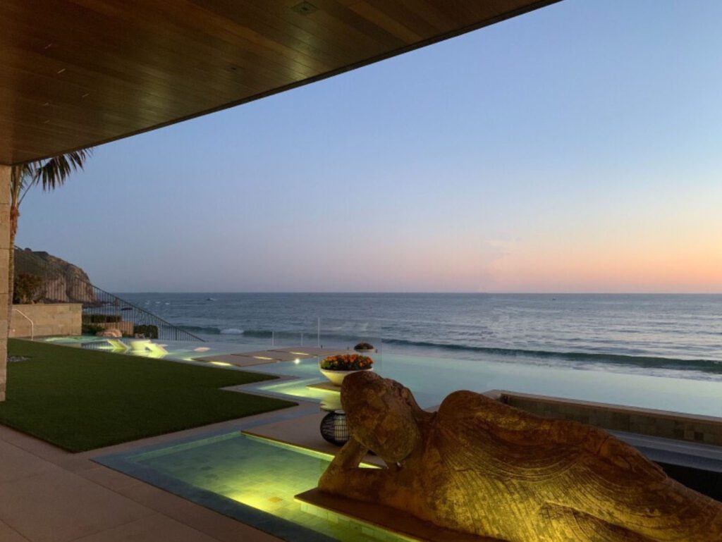 Pool designed by Daniel Stewart at The Strand in Dana Point, CA.  Buddha statue in the foreground.